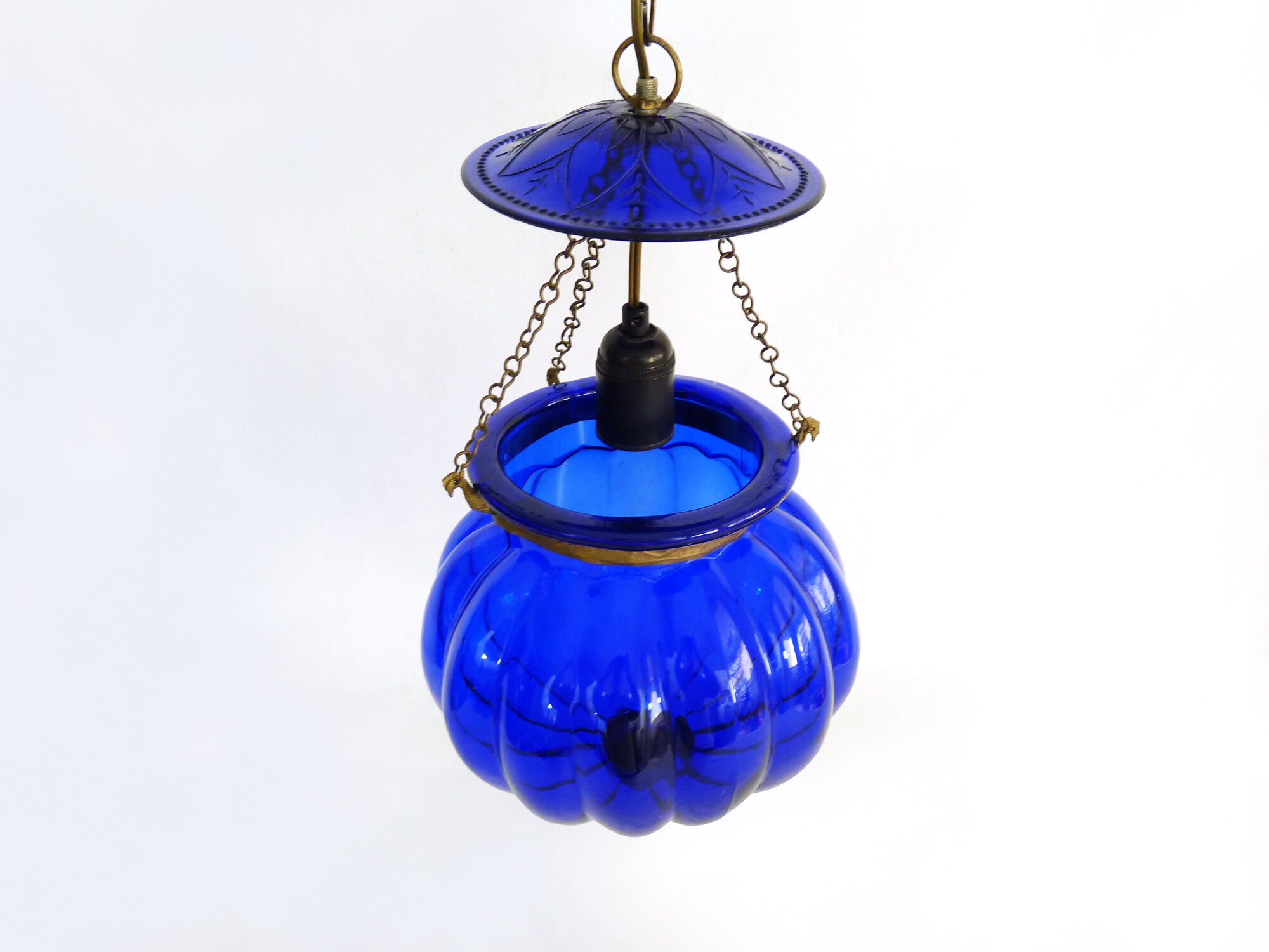 Suspension chandelier, oriental blue glass lantern and brass structure. Year 70-80