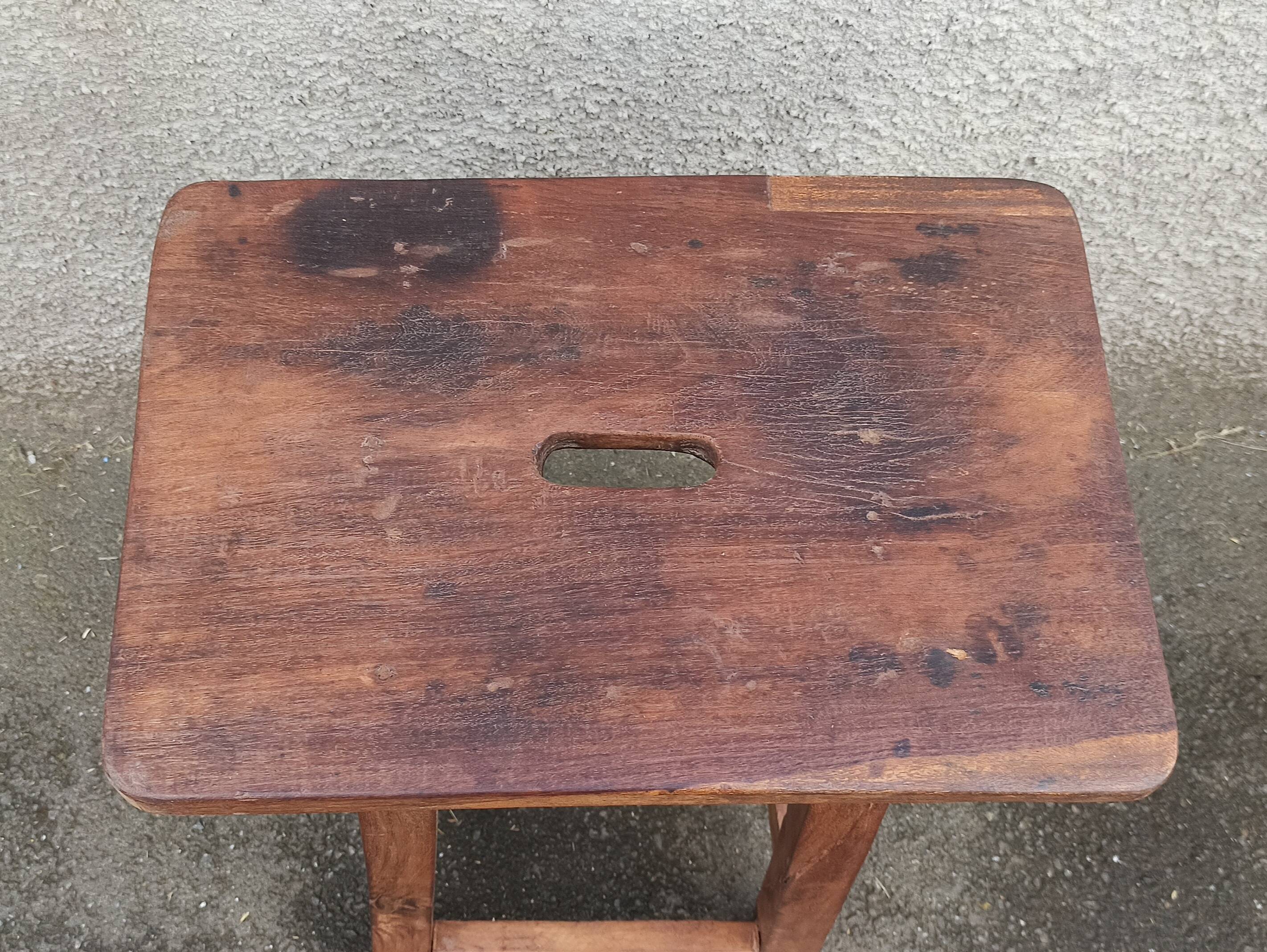 Old wooden high stool