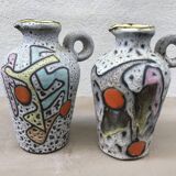 Pair of Marius Bessone vases, pitchers