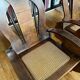 Pair of Art Deco armchairs in wood and cane.