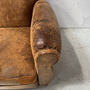 Antique 20th century tan leather club armchair