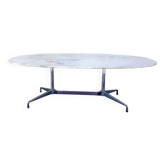 Eames "Segmented" oval table in white marble with stainless steel base, H. Miller, 1970.