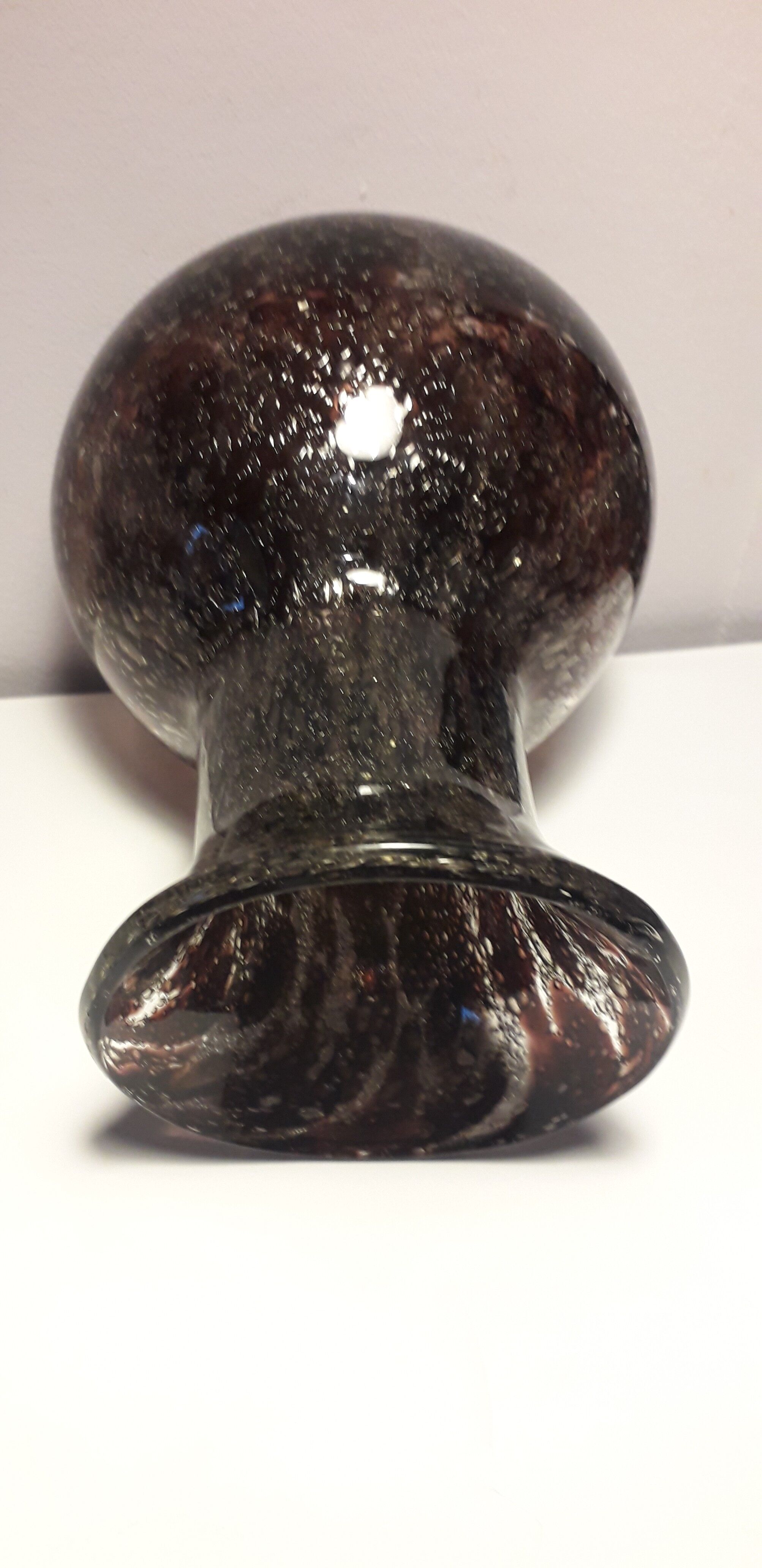 Plum-colored bubbled blown glass vase