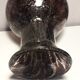 Plum-colored bubbled blown glass vase
