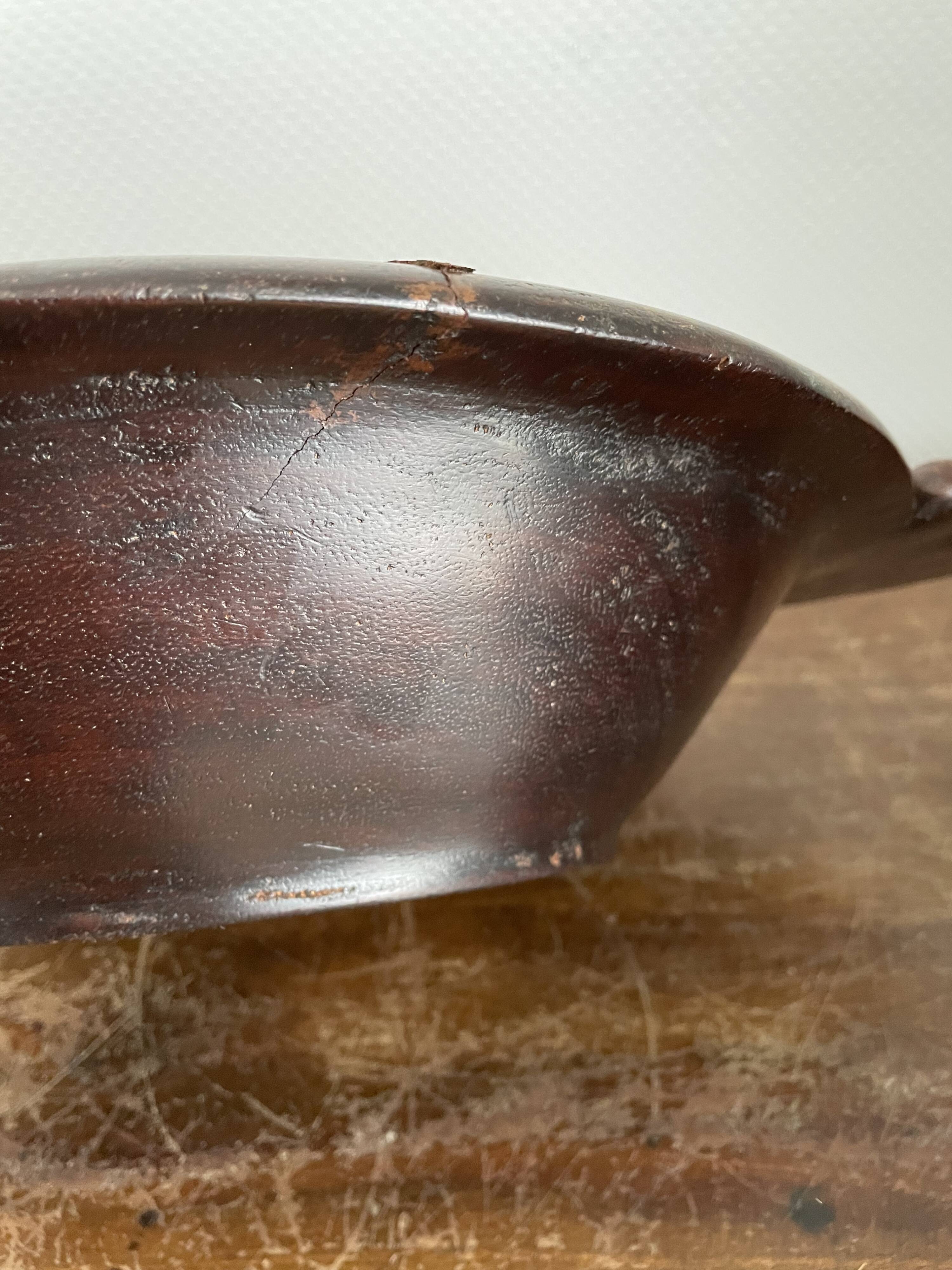 Hollow carved wooden dish