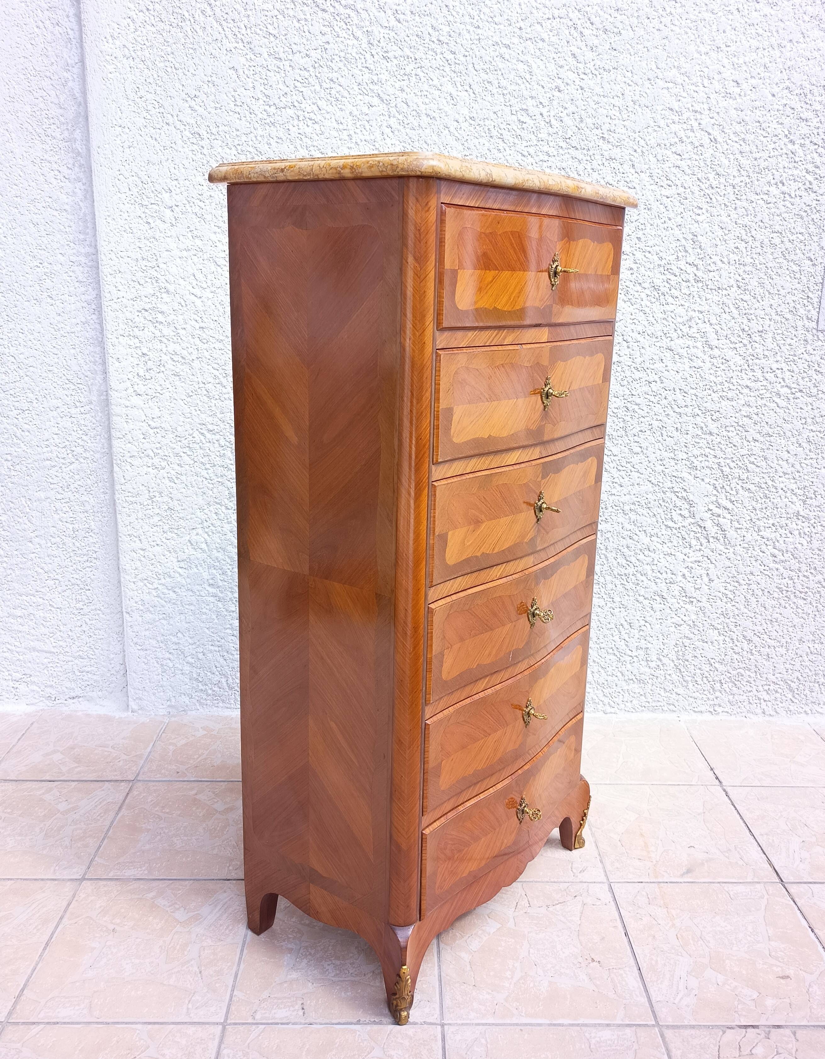 Louis XV style chest of drawers in precious wood veneer.