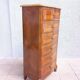 Louis XV style chest of drawers in precious wood veneer.