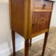 Louis XVI style bedside table, with a marble top and marquetry.