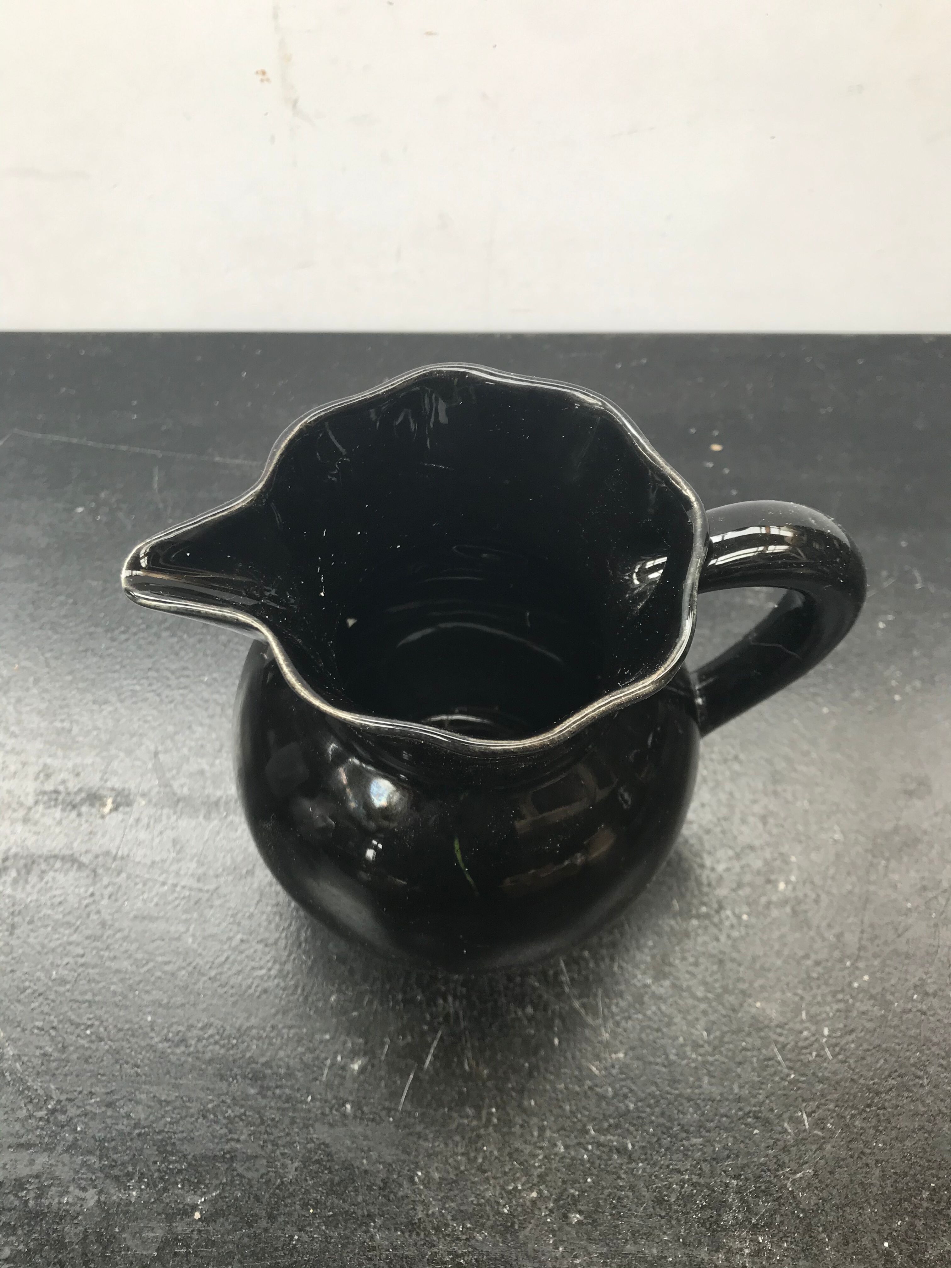 Former black ceramics pitcher vintage 70s