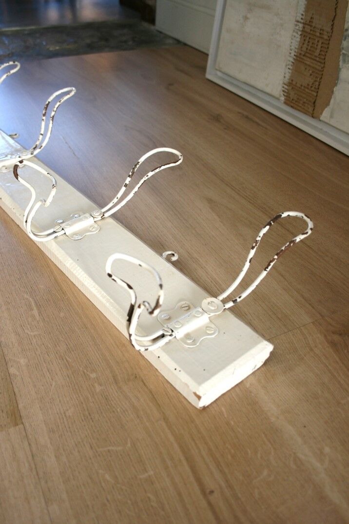 Metal and wood wall coat rack