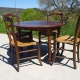 Antique walnut table with drop-leaf doors