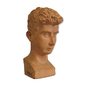 A man's terracotta bust, dated and signed