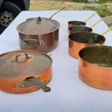 Lots of tinned copper kitchen utensils