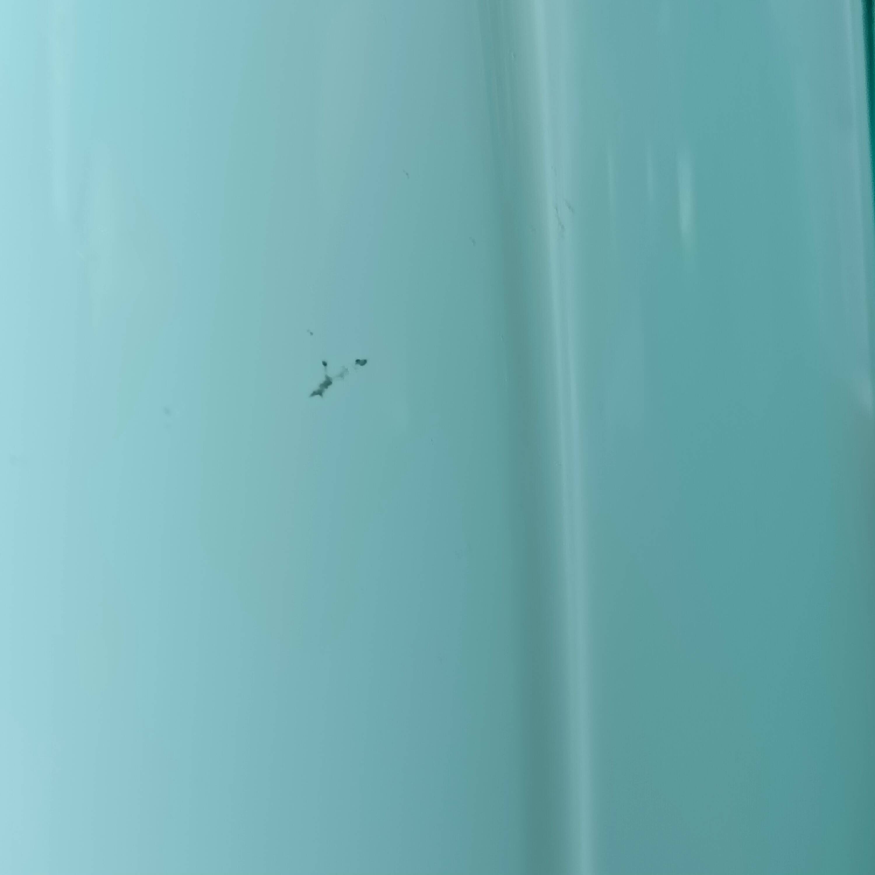 Large light blue opaline vase with a wavy neck.