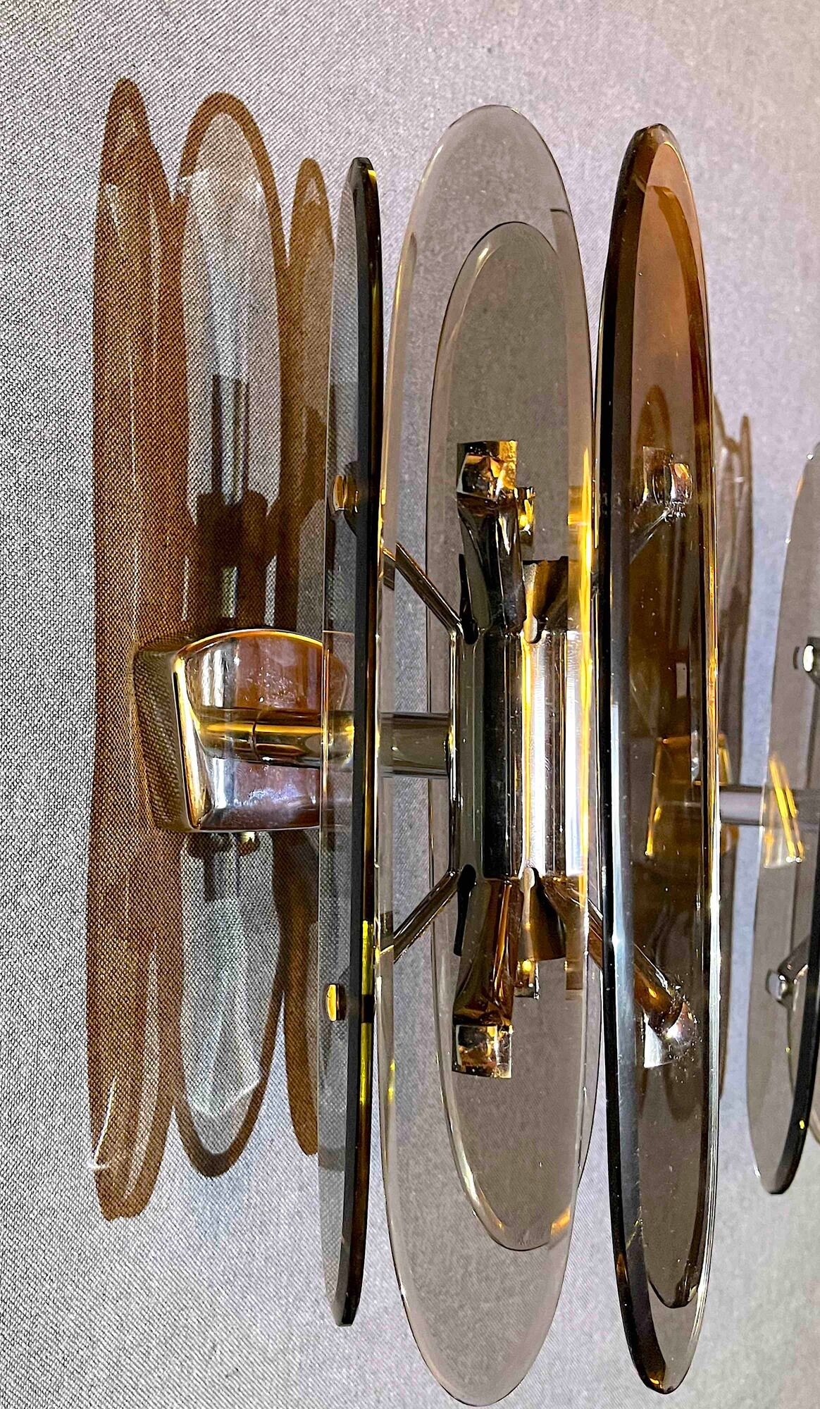 Pair of Italian wall lamp in glass and chrome, 1970's