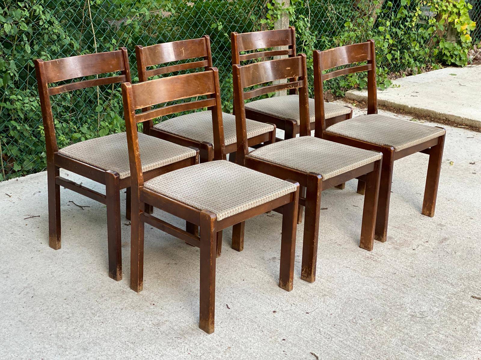 6 Scandinavian Baumann chairs in solid wood and beige fabric.