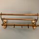 Antique brass coat rack and wall-mounted hat holder
