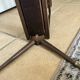 Folding magazine rack with shelf