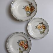3 Digoin Sarreguemines Adèle plates in grey, yellow, and burgundy.