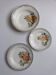 3 Digoin Sarreguemines Adèle plates in grey, yellow, and burgundy.