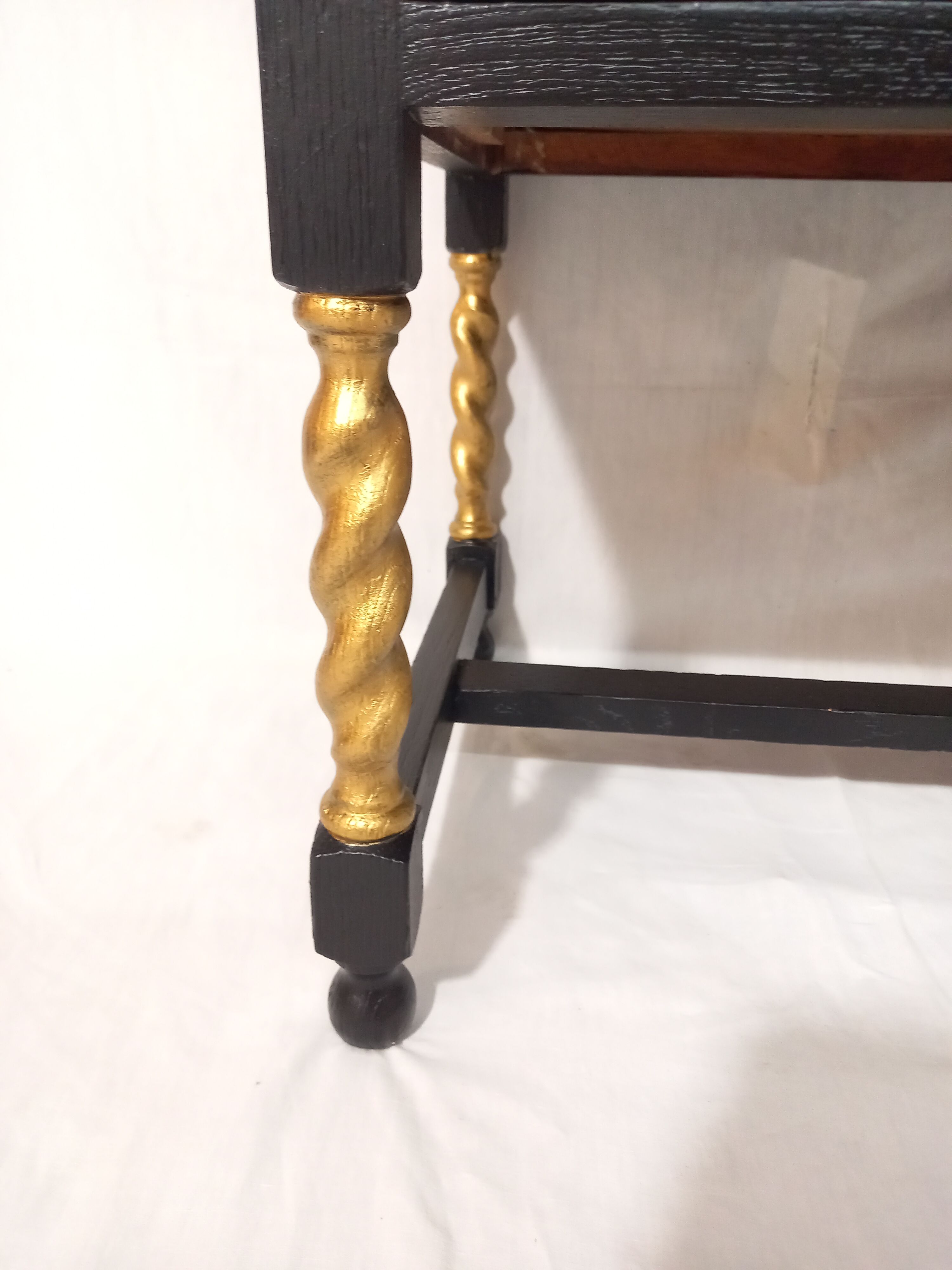 Small secretary with black and gold lid