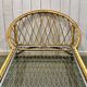 1960s rattan bed with metal base.