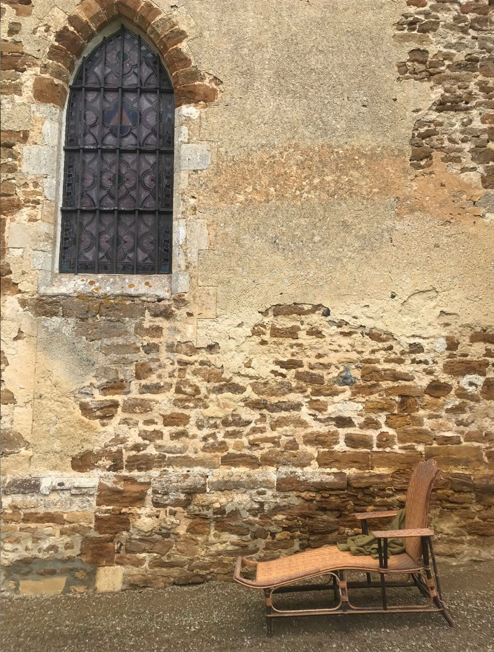 Old rattan lounger.