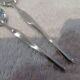 2 Christofle goldsmith mocha and coffee spoons, Duo model, 10 & 13.5cm