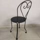 4 black garden chairs