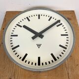 Grey industrial factory wall clock from pragotron, 1960s