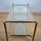 Rare bronze, brass, and steel mesh coffee table with a double glass top resting on a brass mesh. French work by Jansen
