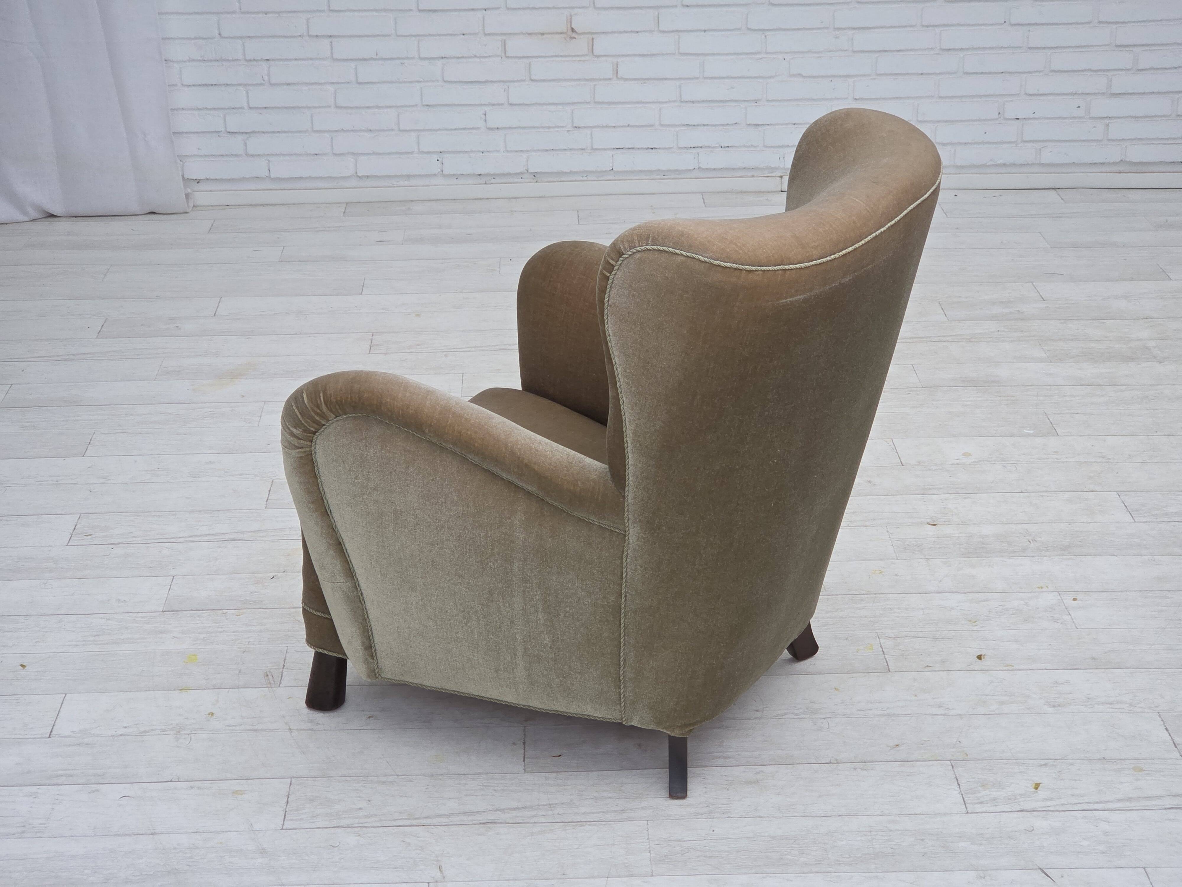 1960s, Danish armchair, green furniture velour, oak wood legs.