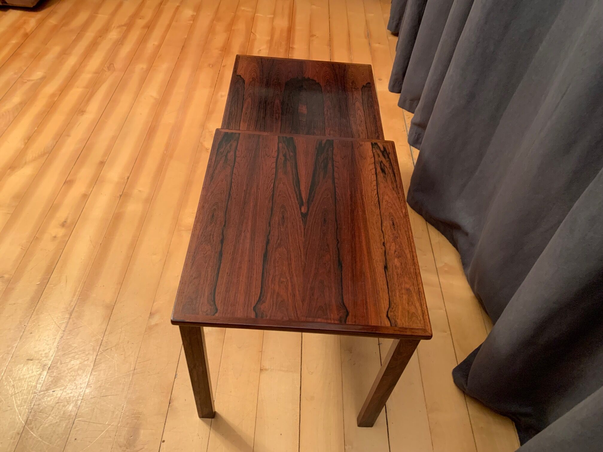 A pair of Kvalitet Form Funktion rosewood side tables Denmark 1960s