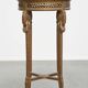 Antique French side table with a gold-coloured wooden frame and marble top