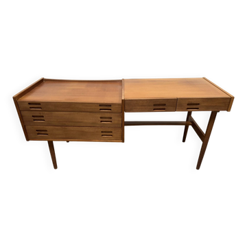 Scandinavian mid-century desk with a cabinet and mahogany finish.
