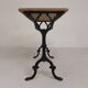 Bistro table with an oak top on a cast iron base, 1930s.