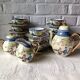 Vintage Japanese fine porcelain tea set with landscape pattern.