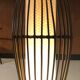 Grande lampe de sol en rotin 1960