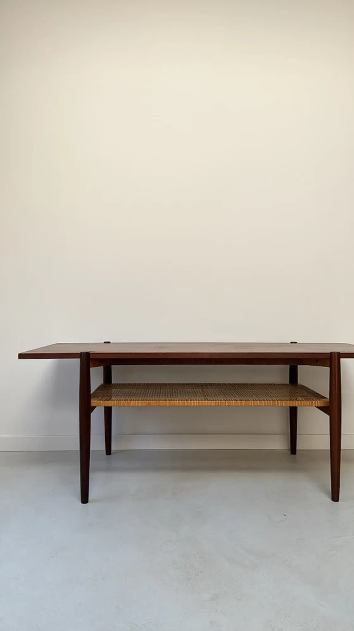 Vintage wooden coffee table with wicker lower shelf