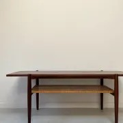 Vintage wooden coffee table with wicker lower shelf