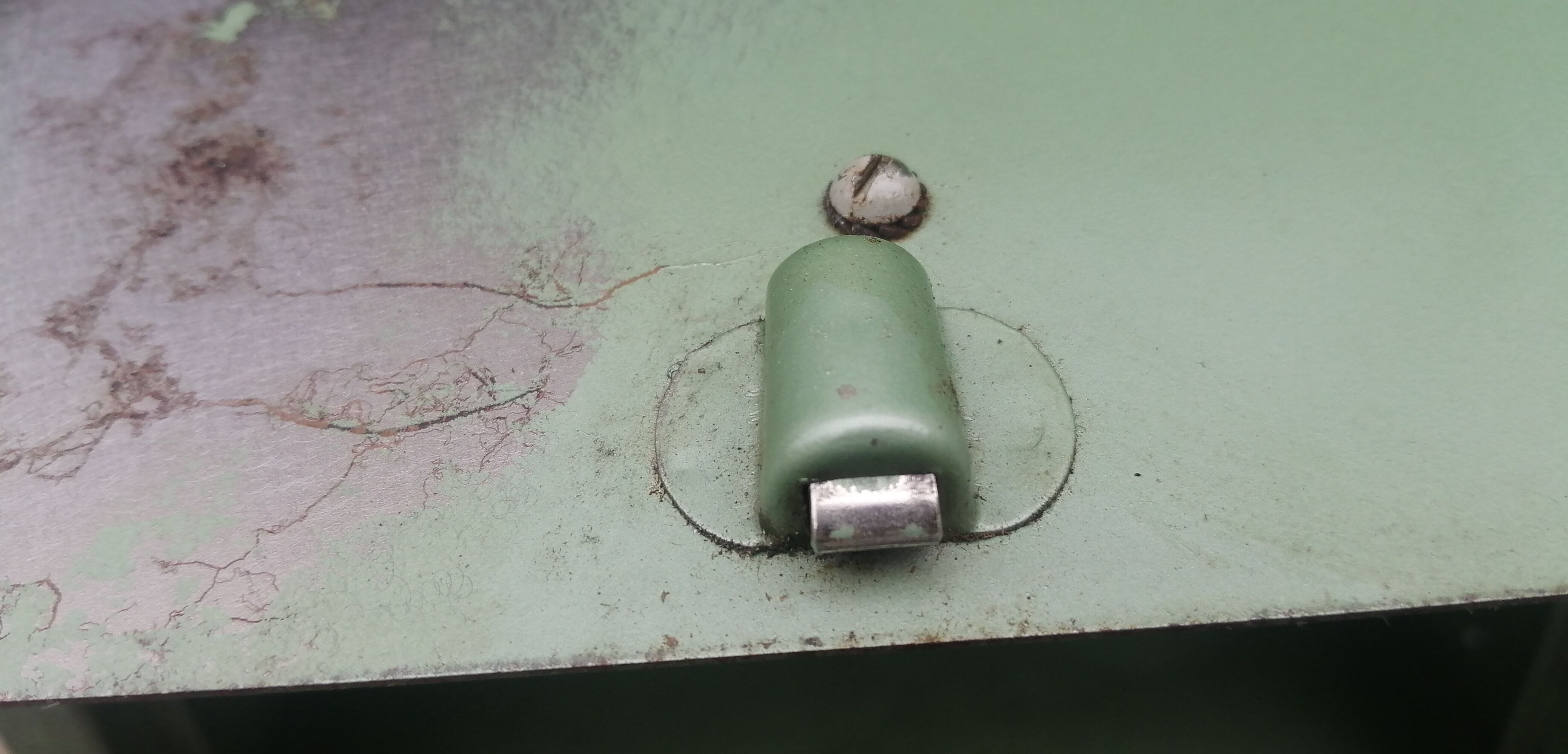 Antique metal cabinet with valves