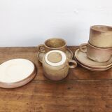 4 sandstone cups with under cups