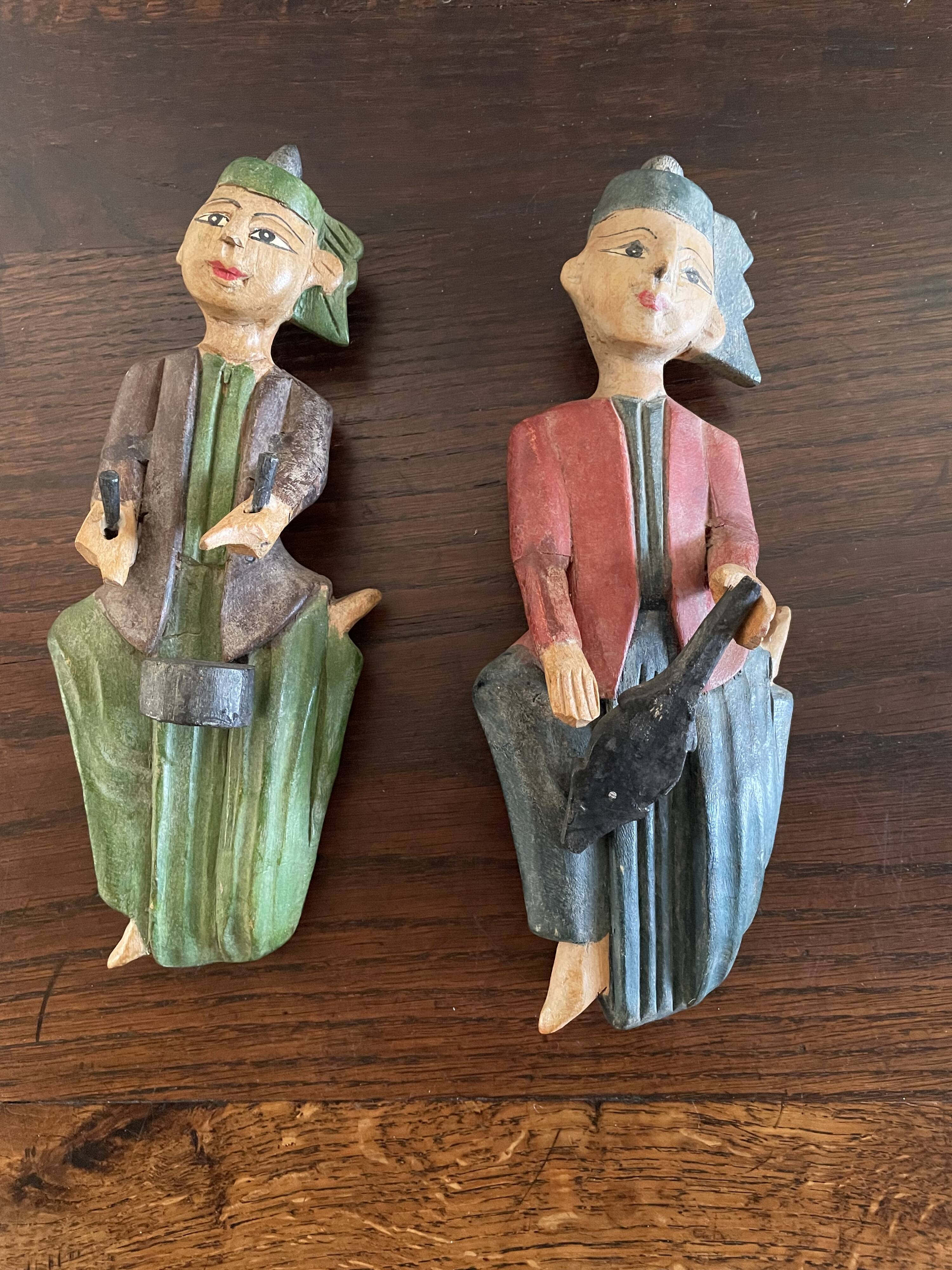 Polychrome wooden statuettes musicians from Asia