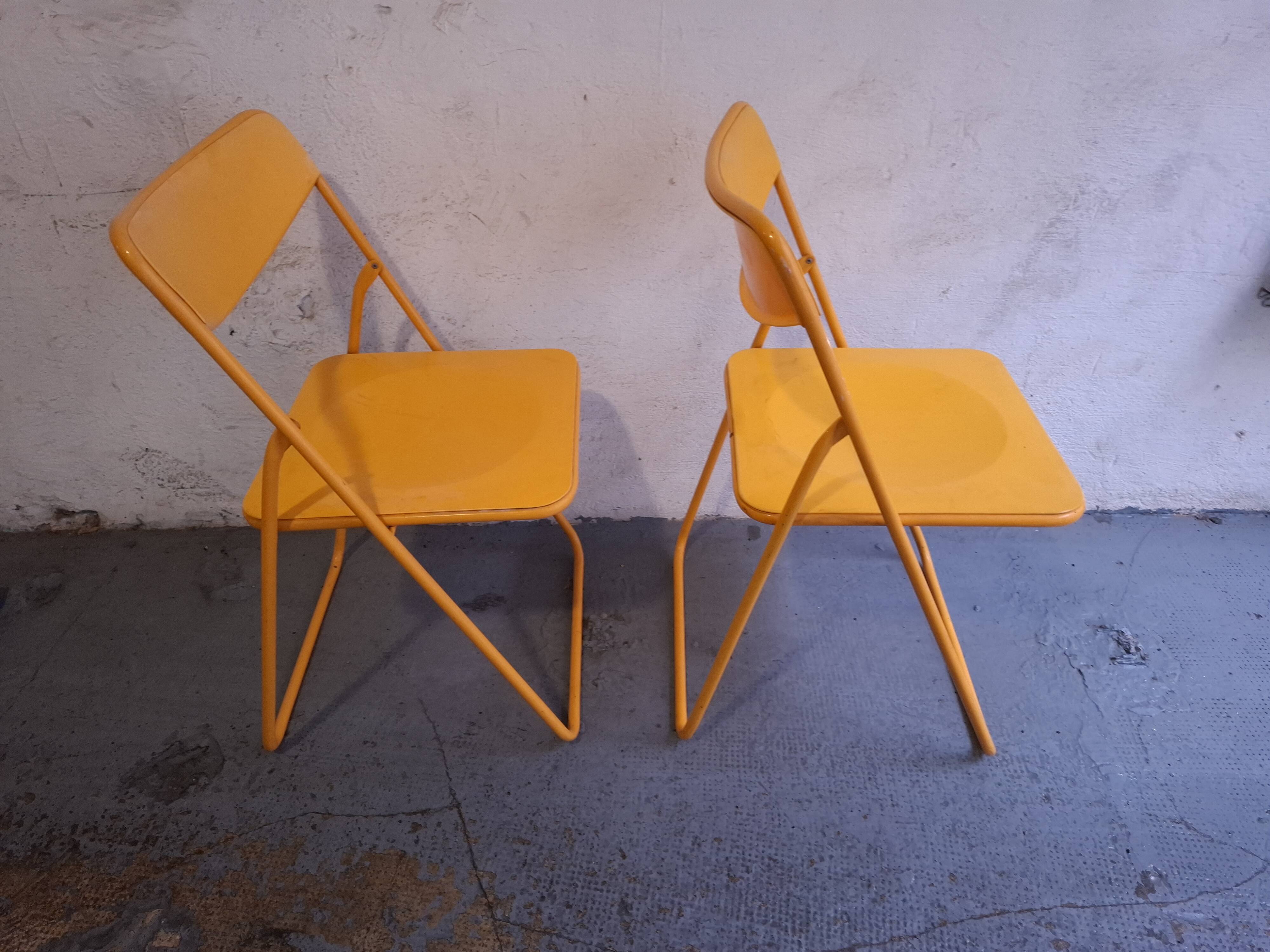 Two ikea folding chairs, niels gammelgaard