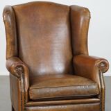 Sheep leather wingback chair with patina
