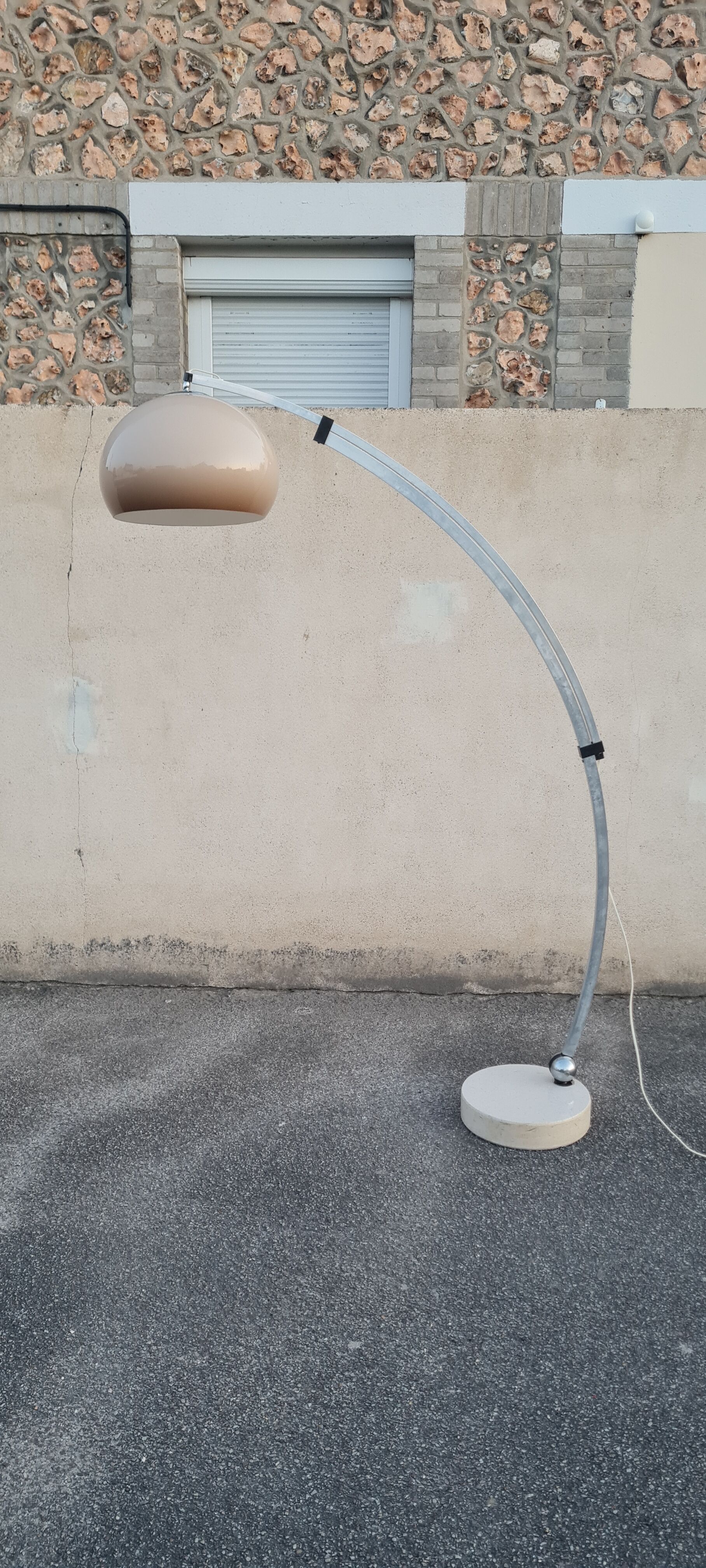 Arch floor lamp by Harvey guzzini 70s