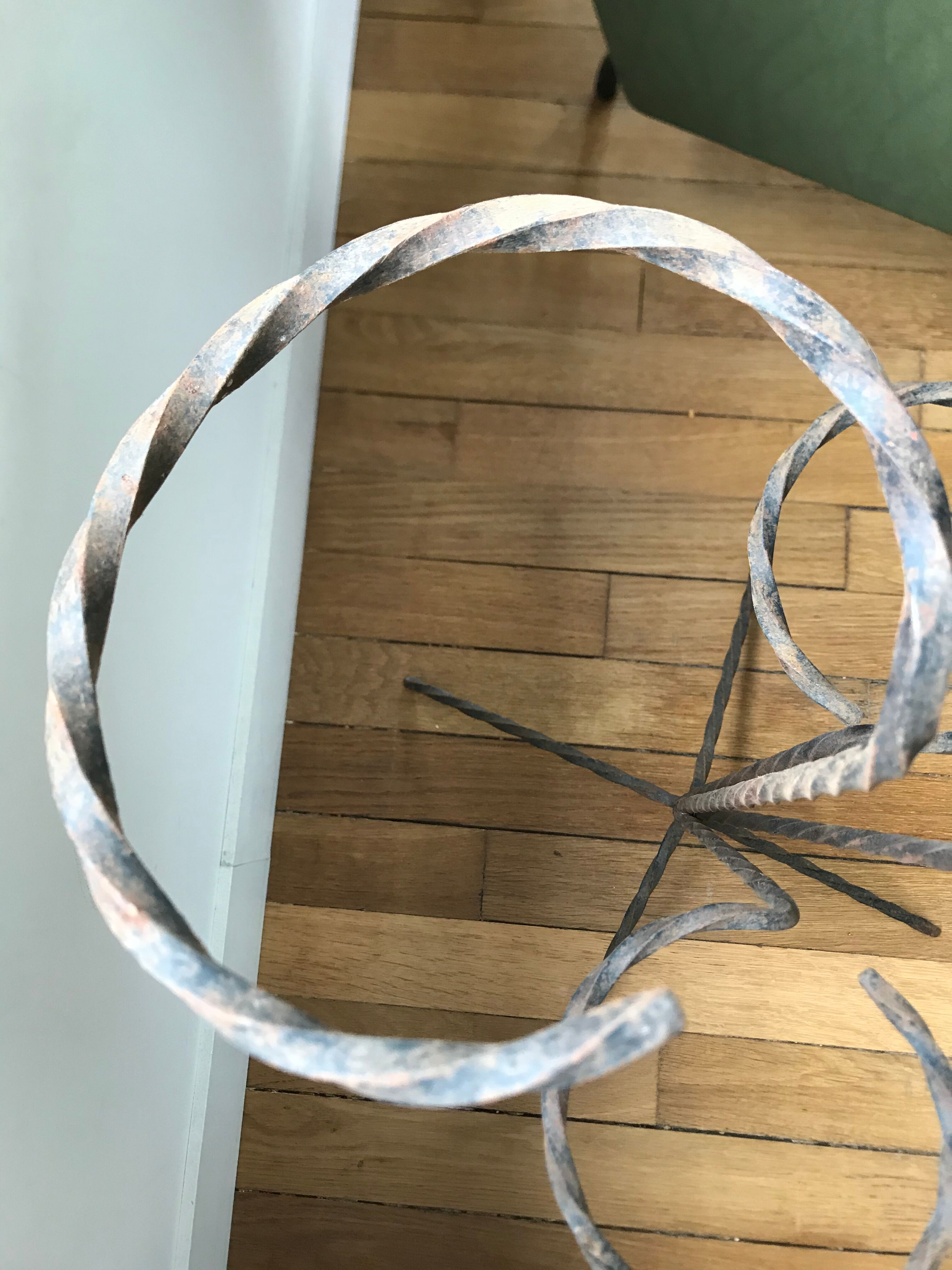 Wrought iron plant holders