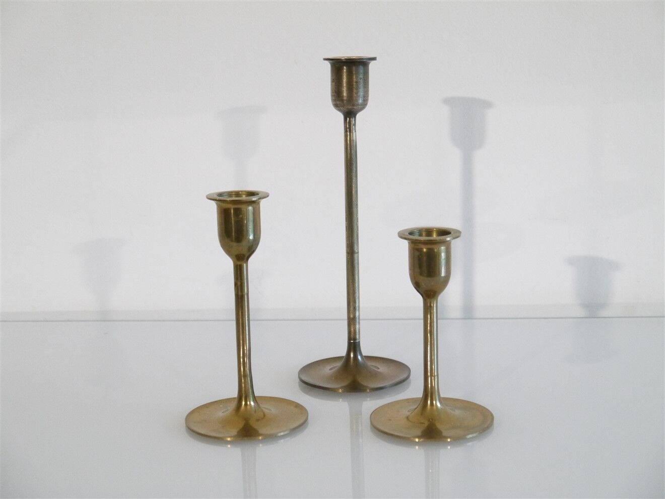 Set of 3 scandinavian brass candlesticks 1960
