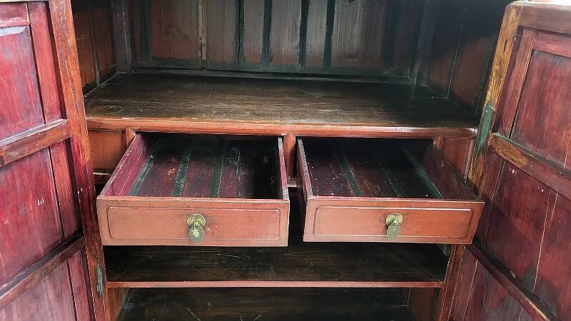 Small Asian lacquered wardrobe with 2 doors and 5 drawers.