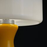 Mid-century Italian yellow table lamp from the 1970s.
